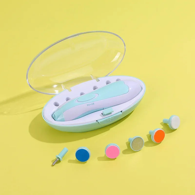 Blue teal Electric baby trimmer safe shown in case with different trimmer pad options