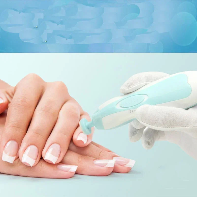 Electric baby trimmer safe showing product with different trimmer pad options top angle
