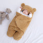 Cute and cuddly Khaki brown baby bear blanket with baby wrapped up cozy with arms outstretched versatile for baby's temperature comfort 