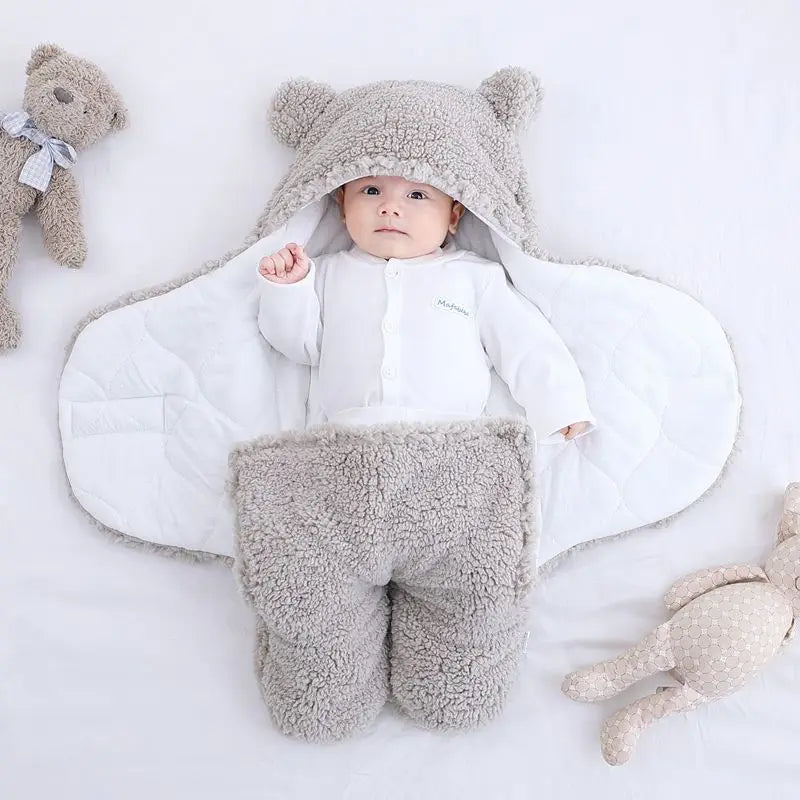Cute and cuddly gray grey baby bear blanket with baby wrapped up cozy with arms outstretched versatile for baby's temperature comfort 